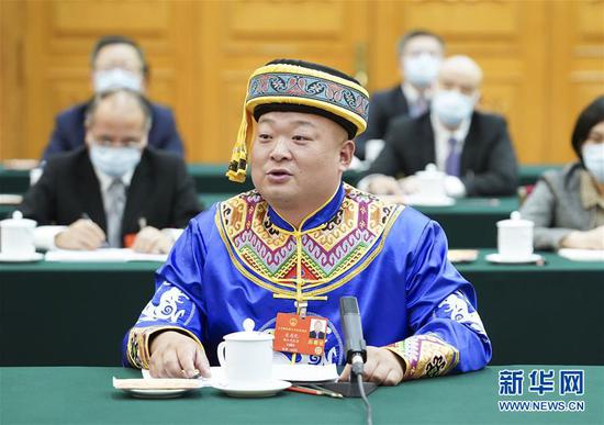  5月24日，全國人大代表宋慶禮參加湖北代表團的審議并發(fā)言。新華社記者 黃敬文 攝